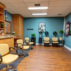 Take advantage of all The Auberge at Aspen Park has to offer a room with chairs and a table