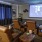 a living room with a large screen