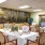 a room with tables and chairs