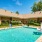 a swimming pool in front of a building